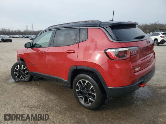 2020 Jeep Compass Trailhawk with VIN 3C4NJDDB5LT122219, listed as a Copart auction lot 47773725 with 165,376 mi miles and Salvage Title. Bid and sale history available at carsss.com. Image 2.