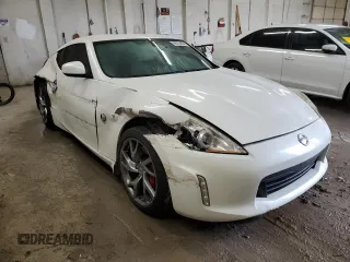 2013 Nissan 370Z Touring z VIN JN1AZ4EH5DM383466, wystawiony jako Copart lot #85704054 z przebiegiem 37 892 mil mil oraz Szkoda całkowita • Salvage title. Historia ofert i sprzedaży dostępna na DreamBid. Obrazek 4.