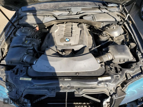 2007 BMW 7 Series 750i with VIN WBAHL83507DT07958, listed as a Copart auction lot 73318944 with 127,698 mi miles and Salvage Title. Bid and sale history available at DreamBid. Image 11.