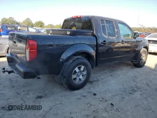 2010 Nissan Frontier LE with VIN 1N6AD0EV1AC407478, listed as a Copart auction lot 82302504 with 146,560 mi miles and Salvage title. Bid and sale history available at DreamBid. Image 3.
