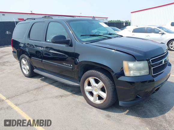 2007 Chevrolet Tahoe LTZ with VIN 1GNFC13007R111180, listed as a IAAI auction lot 42381749 with 126,472 mi miles and . Bid and sale history available at DreamBid. Image 1.
