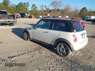 2006 MINI Hardtop with VIN WMWRC335X6TK16871, listed as a IAAI auction lot 41846929 with 145,709 mi miles and . Bid and sale history available at DreamBid. Image 3.