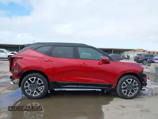 2024 Chevrolet Blazer RS z VIN 3GNKBERS5RS184241, wystawiony jako IAAI lot #41408120 z przebiegiem 11 857 mil mil oraz . Historia ofert i sprzedaży dostępna na DreamBid. Obrazek 14.