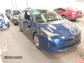 2017 Toyota Prius Two z VIN JTDKARFU5H3539065, wystawiony jako IAAI lot #41745348 z przebiegiem 125 913 mil mil oraz . Historia ofert i sprzedaży dostępna na DreamBid. Obrazek 1.