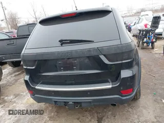 2013 Jeep Grand Cherokee Overland with VIN 1C4RJFCG1DC593890, listed as a IAAI auction lot 41264434 with 204,324 mi miles. Bid and sale history available at carsss.com. Image 15.