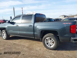 2017 Chevrolet Silverado 1500 LT with VIN 3GCUKREC5HG348435, listed as a IAAI auction lot 41821369 with 140,000 mi miles and . Bid and sale history available at DreamBid. Image 15.