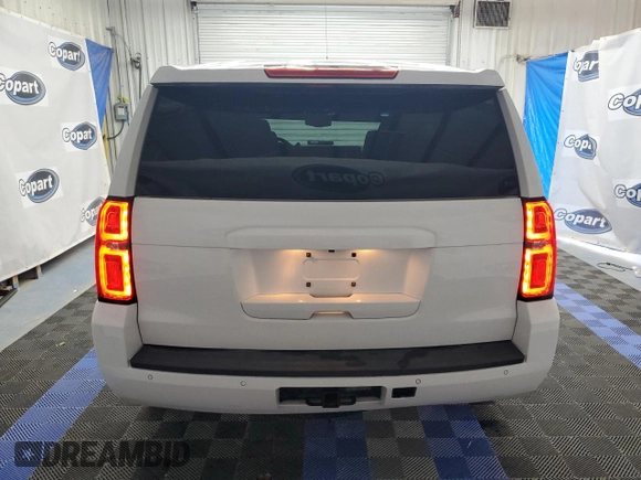 2015 Chevrolet Tahoe Commercial with VIN 1GNLC2ECXFR269024, listed as a Copart auction lot 61911165 with 182,445 mi miles and Clean title. Bid and sale history available at DreamBid. Image 6.