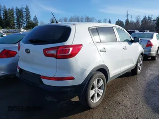 2012 Kia Sportage LX with VIN KNDPB3A24C7317060, listed as a IAAI auction lot 41725826 with 122,574 mi miles. Bid and sale history available at carsss.com. Image 4.