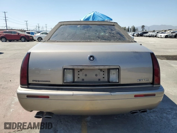 2002 Cadillac Eldorado Touring ETC z VIN 1G6ET12952B101866, wystawiony jako Copart lot #57365965 z przebiegiem Nie podano mil oraz Tytuł czysty. Historia ofert i sprzedaży dostępna na DreamBid. Obrazek 6.
