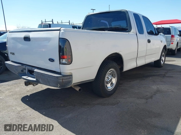 2003 Ford F-150 XL with VIN 1FTRX17W53NB22038, listed as a IAAI auction lot 42630948 with 1,556,035 mi miles and . Bid and sale history available at DreamBid. Image 4.