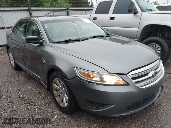 2011 Ford Taurus SE with VIN 1FAHP2DW2BG181059, listed as a IAAI auction lot 42036867 with 103,394 mi miles. Bid and sale history available at carsss.com. Image 1.