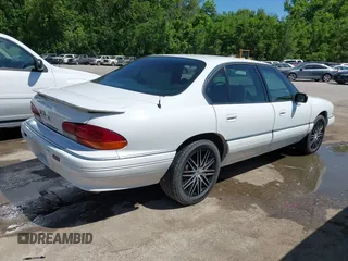 1993 Pontiac Bonneville SE z VIN 1G2HX53L8P1281104, wystawiony jako IAAI lot #42219547 z przebiegiem 113 292 mil mil oraz . Historia ofert i sprzedaży dostępna na DreamBid. Obrazek 4.