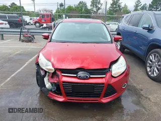 2012 Ford Focus SEL with VIN 1FAHP3H27CL338414, listed as a IAAI auction lot 41925915 with 128,123 mi miles. Bid and sale history available at carsss.com. Image 12.