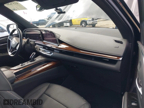2022 Cadillac Escalade Luxury z VIN 1GYS4AKL2NR110264, wystawiony jako IAAI lot #41576203 z przebiegiem 29 457 mil mil oraz . Historia ofert i sprzedaży dostępna na DreamBid. Obrazek 5.