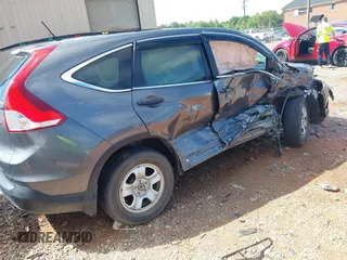 2013 Honda CR-V LX z VIN 2HKRM4H39DH681477, wystawiony jako IAAI lot #42225458 z przebiegiem 43 481 mil mil oraz . Historia ofert i sprzedaży dostępna na DreamBid. Obrazek 4.
