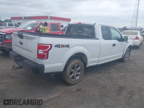 2018 Ford F-150 XL with VIN 1FTEX1EP1JKF66557, listed as a IAAI auction lot 42099567 with 126,516 mi miles and . Bid and sale history available at DreamBid. Image 4.