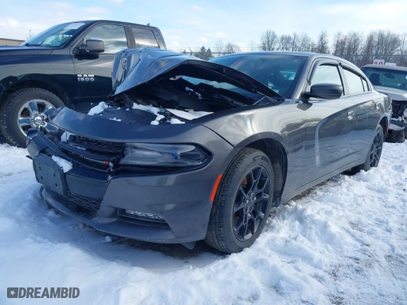 2016 Dodge Charger SXT with VIN 2C3CDXJG4GH155943, listed as a IAAI auction lot 41672667 with 105,332 mi miles. Bid and sale history available at carsss.com. Image 2.