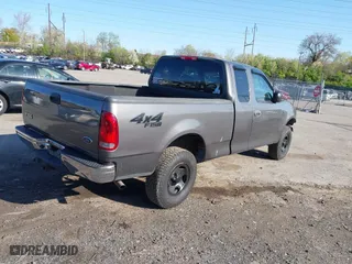 2004 Ford F-150 Heritage XL with VIN 2FTRX18W34CA97890, listed as a IAAI auction lot 42060361 with 177,385 mi miles. Bid and sale history available at carsss.com. Image 4.