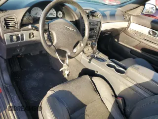 2003 Ford Thunderbird Deluxe z VIN 1FAHP60A43Y111849, wystawiony jako Copart lot #76742564 z przebiegiem Nie podano mil oraz Szkoda całkowita • Salvage title. Historia ofert i sprzedaży dostępna na DreamBid. Obrazek 8.