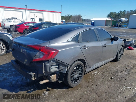 2019 Honda Civic Sedan LX with VIN 2HGFC2F61KH533807, listed as a IAAI auction lot 41564512 with 190,994 mi miles. Bid and sale history available at carsss.com. Image 4.