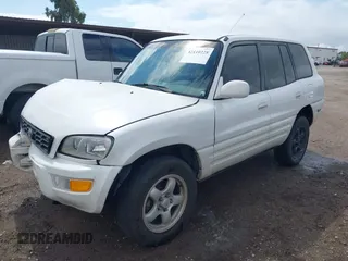 1999 Toyota RAV4 with VIN JT3GP10V7X7057281, listed as a IAAI auction lot 42110228 with 301,749 mi miles and . Bid and sale history available at DreamBid. Image 2.
