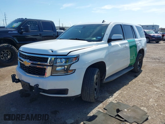 2015 Chevrolet Tahoe Commercial z VIN 1GNLC2EC8FR255526, wystawiony jako IAAI lot #42538320 z przebiegiem 165 502 mil mil oraz . Historia ofert i sprzedaży dostępna na DreamBid. Obrazek 17.