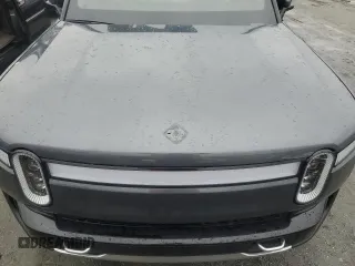 2022 Rivian R1T Adventure z VIN 7FCTGAAA5NN014020, wystawiony jako Copart lot #81367764 z przebiegiem Nie podano mil oraz Szkody całkowita. Historia ofert i sprzedaży dostępna na DreamBid. Obrazek 11.