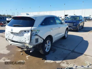 2014 Acura RDX Tech Pkg with VIN 5J8TB3H59EL014382, listed as a IAAI auction lot 41649885 with 104,542 mi miles. Bid and sale history available at carsss.com. Image 4.