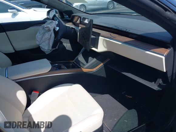 2022 Tesla Model S z VIN 5YJSA1E56NF490064, wystawiony jako IAAI lot #41858477 z przebiegiem Nie podano mil oraz . Historia ofert i sprzedaży dostępna na DreamBid. Obrazek 5.