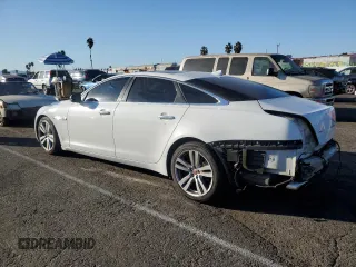 2014 Jaguar XJ with VIN SAJWA2GZ7E8V66626, listed as a Copart auction lot 78824254 with 132,720 mi miles and Salvage Title. Bid and sale history available at carsss.com. Image 2.