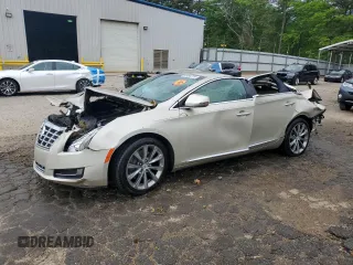 2014 Cadillac XTS z VIN 2G61L5S30E9316434, wystawiony jako Copart lot #54053315 z przebiegiem Nie podano mil oraz Nie do naprawy. Historia ofert i sprzedaży dostępna na DreamBid. Obrazek 1.