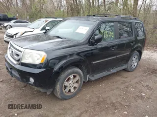 2009 Honda Pilot Touring with VIN 5FNYF48959B016978, listed as a IAAI auction lot 41947782 with 234,115 mi miles and . Bid and sale history available at carsss.com. Image 18.