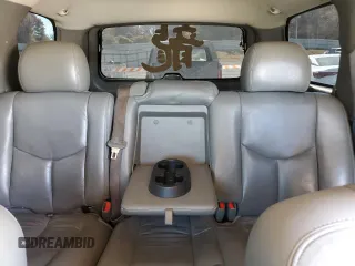 2006 GMC Yukon SLT with VIN 1GKEK13T96J110533, listed as a Copart auction lot 77797364 with 209,339 mi miles and Salvage Title. Bid and sale history available at carsss.com. Image 10.