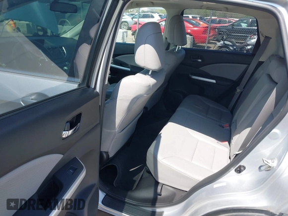 2015 Honda CR-V EX-L with VIN 2HKRM3H70FH552818, listed as a IAAI auction lot 41983061 with 202,898 mi miles and . Bid and sale history available at carsss.com. Image 8.