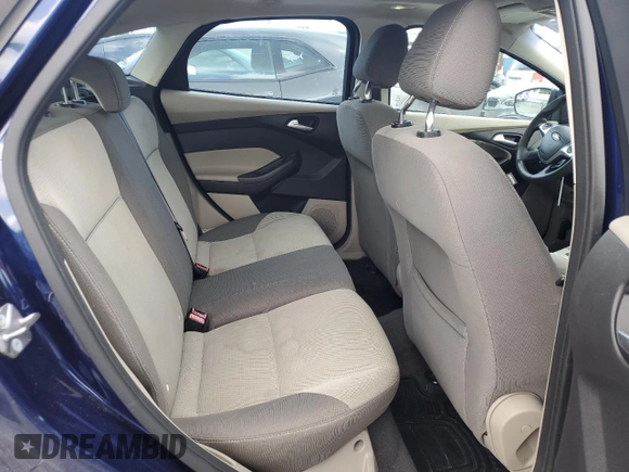 2012 Ford Focus SE z VIN 1FAHP3K22CL126478, wystawiony jako Copart lot #60053565 z przebiegiem 130 887 mil mil oraz Czysty tytuł • Clean title. Historia ofert i sprzedaży dostępna na DreamBid. Obrazek 11.