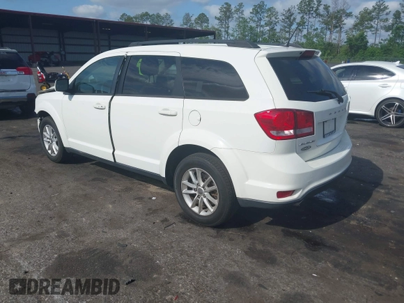 2015 Dodge Journey SXT with VIN 3C4PDCBG0FT653857, listed as a IAAI auction lot 42128410 with 182,960 mi miles and . Bid and sale history available at DreamBid. Image 3.