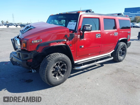 2003 Hummer H2 with VIN 5GRGN23U23H104200, listed as a IAAI auction lot 41687769 with 1 mi miles. Bid and sale history available at carsss.com. Image 2.