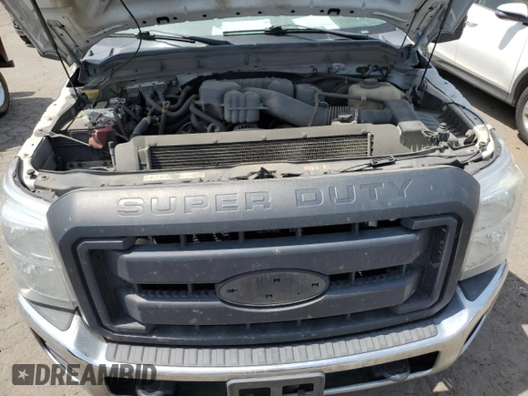 2014 Ford F-250 XL with VIN 1FTBF2B61EEB69314, listed as a Copart auction lot 57801965 with 165,016 mi miles and Salvage title. Bid and sale history available at DreamBid. Image 11.