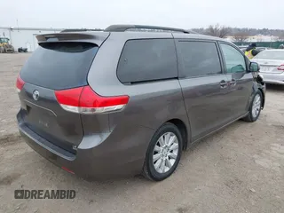 2012 Toyota Sienna LE with VIN 5TDJK3DCXCS047056, listed as a IAAI auction lot 41780756 with 179,624 mi miles. Bid and sale history available at carsss.com. Image 4.