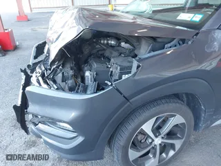 2018 Hyundai Tucson Value with VIN KM8J3CA20JU762120, listed as a IAAI auction lot 41878796 with 103,346 mi miles. Bid and sale history available at carsss.com. Image 18.