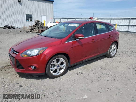 2014 Ford Focus Titanium with VIN 1FADP3N21EL421469, listed as a Copart auction lot 59744685 with 68,436 mi miles and Salvage title. Bid and sale history available at DreamBid. Image 1.