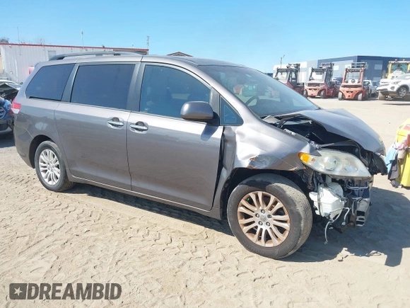 2012 Toyota Sienna XLE AAS with VIN 5TDYK3DC1CS186331, listed as a IAAI auction lot 41545031 with 240,788 mi miles and . Bid and sale history available at DreamBid. Image 1.