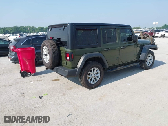 2023 Jeep Wrangler Willys with VIN 1C4HJXDG7PW646627, listed as a IAAI auction lot 42469601 with 50,178 mi miles and . Bid and sale history available at DreamBid. Image 4.