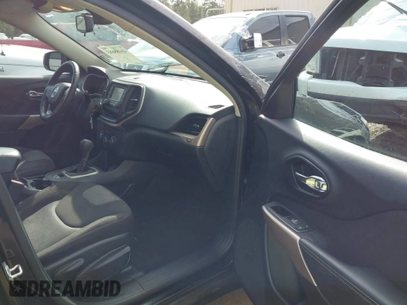 2017 Jeep Cherokee Altitude with VIN 1C4PJLAB7HW660624, listed as a IAAI auction lot 41488683 with 106,963 mi miles and . Bid and sale history available at DreamBid. Image 5.