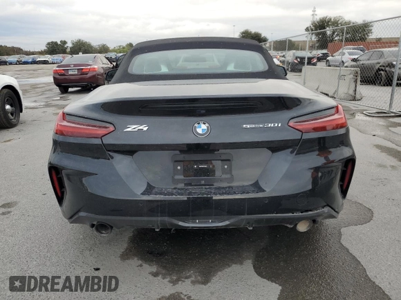 2024 BMW Z4 sDrive30i with VIN WBAHF3C00RWY36641, listed as a Copart auction lot 84011464 with 0 mi miles and Salvage Title. Bid and sale history available at carsss.com. Image 6.