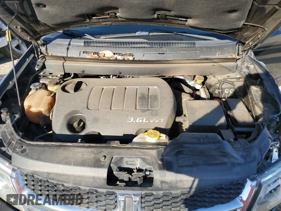 2013 Dodge Journey SXT with VIN 3C4PDDBG2DT579179, listed as a Copart auction lot 46443415 with 180,456 mi miles and Salvage Title. Bid and sale history available at DreamBid. Image 13.