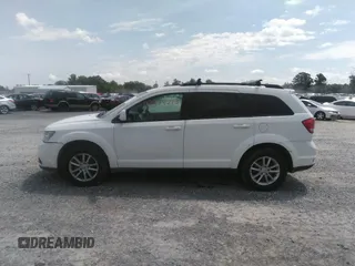 2017 Dodge Journey SXT z VIN 3C4PDCBG3HT537331, wystawiony jako IAAI lot #42694213 z przebiegiem 193 609 mil mil oraz . Historia ofert i sprzedaży dostępna na DreamBid. Obrazek 14.