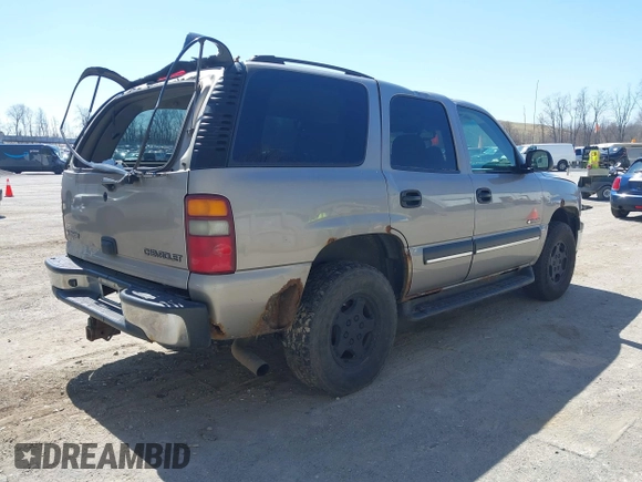 2003 Chevrolet Tahoe LT with VIN 1GNEK13Z83J107450, listed as a IAAI auction lot 42006801 with 310,767 mi miles and . Bid and sale history available at DreamBid. Image 4.
