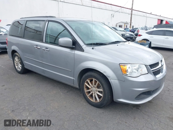 2016 Dodge Grand Caravan SXT with VIN 2C4RDGCG0GR177886, listed as a IAAI auction lot 42138184 with 151,696 mi miles. Bid and sale history available at carsss.com. Image 1.