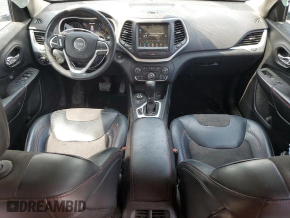 2015 Jeep Cherokee Trailhawk with VIN 1C4PJMBS8FW717950, listed as a Copart auction lot 60321625 with 155,210 mi miles and Salvage title. Bid and sale history available at DreamBid. Image 8.